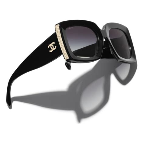 chanel occhiali sole nero lente oro